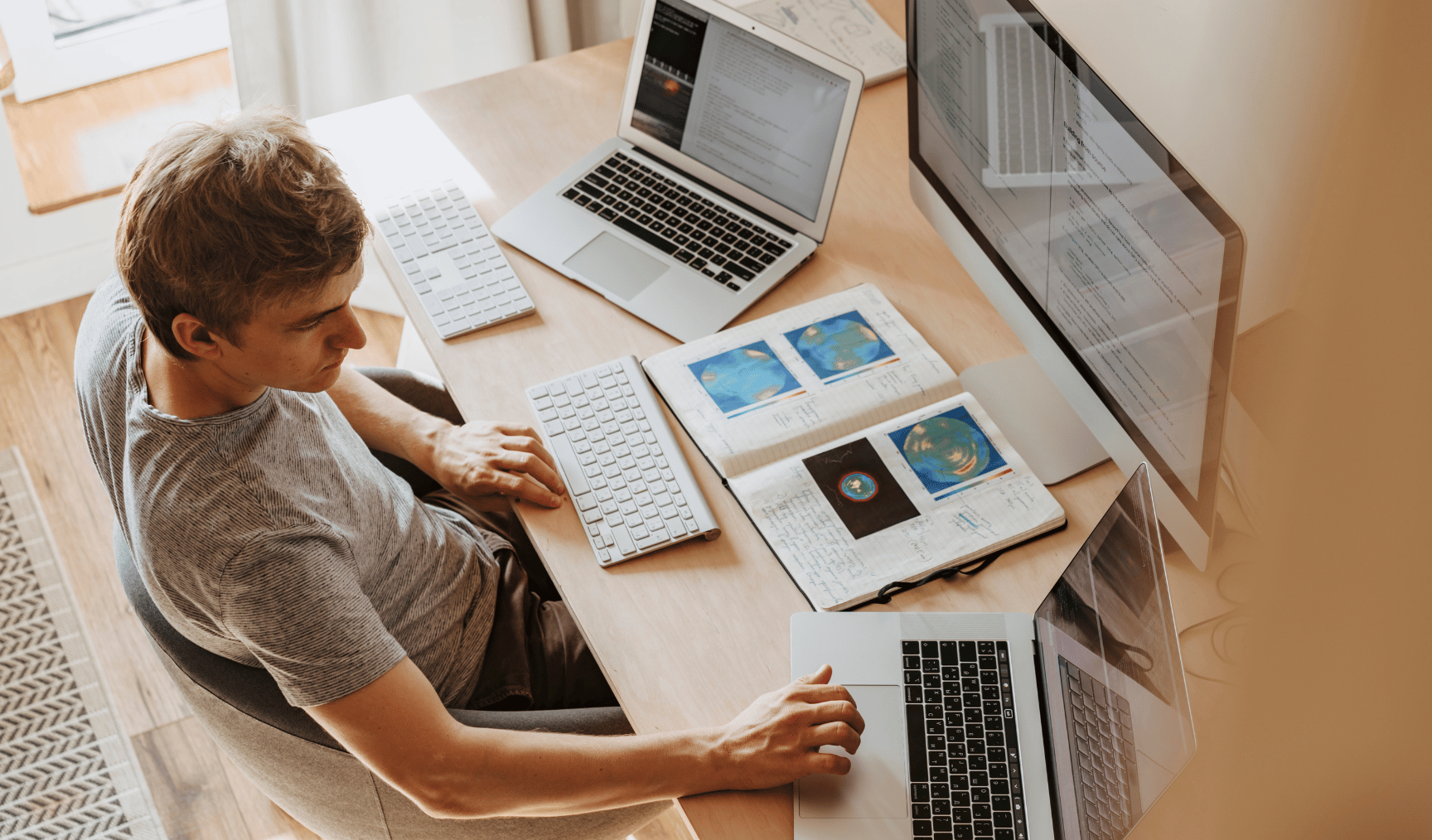image of a man looking at his computer